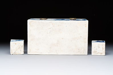 A Chinese blue and white 'Mountainous Landscape' writing set with an inkwell, sander and candlestick, Qianlong