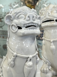 A pair of large Chinese Dehua blanc de Chine Buddhist lion joss stick holders, 19th C.