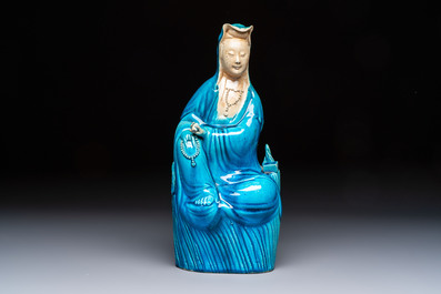 A Chinese turquoise-glazed Guanyin, a white-glazed bottle vase and a blue and white jar, 19th C.