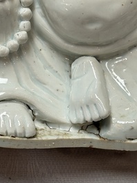 A Chinese white-glazed Milefo Buddha, 19th C.