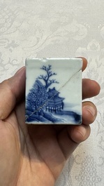 A Chinese blue and white 'Mountainous Landscape' writing set with an inkwell, sander and candlestick, Qianlong