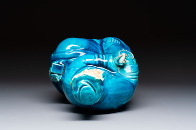 A Chinese turquoise-glazed Guanyin, a white-glazed bottle vase and a blue and white jar, 19th C.