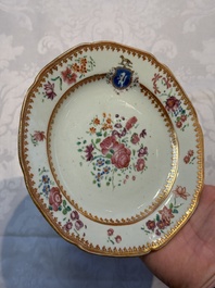 Two Chinese famille rose armorial saucers, Qianlong