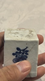 A Chinese blue and white 'Mountainous Landscape' writing set with an inkwell, sander and candlestick, Qianlong