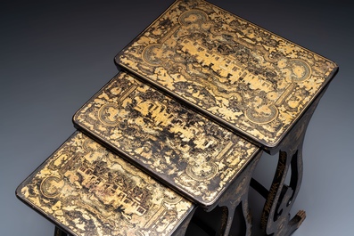 A set of three Chinese Canton gilt-lacquered nesting tables with narrative design, 19th C.