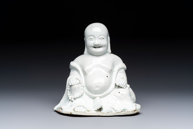 A Chinese white-glazed Milefo Buddha, 19th C.