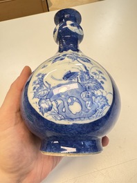 A Chinese blue and white powder-blue-ground hookah base, Kangxi