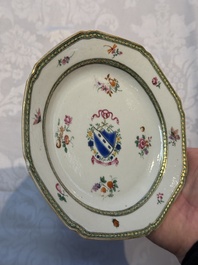 Two Chinese famille rose armorial saucers, Qianlong