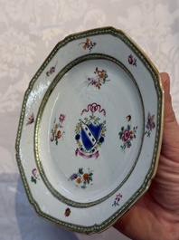 Two Chinese famille rose armorial saucers, Qianlong