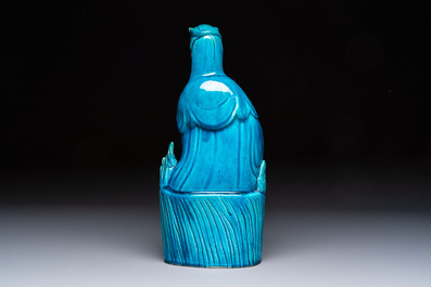A Chinese turquoise-glazed Guanyin, a white-glazed bottle vase and a blue and white jar, 19th C.