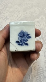 A Chinese blue and white 'Mountainous Landscape' writing set with an inkwell, sander and candlestick, Qianlong