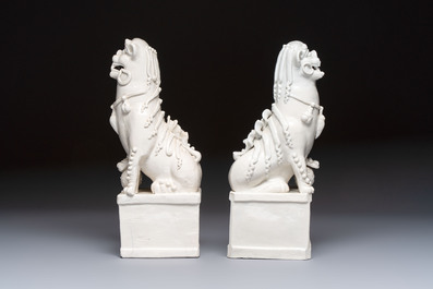 A pair of large Chinese Dehua blanc de Chine Buddhist lion joss stick holders, 19th C.