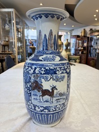 A Chinese blue, white and copper-red 'Deer' vase, 19th C.