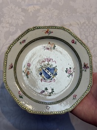 Two Chinese famille rose armorial saucers, Qianlong