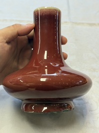 A Chinese flamb&eacute;-glazed vase of compressed form, 19th C.