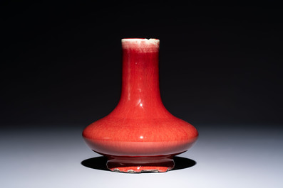 A Chinese flamb&eacute;-glazed vase of compressed form, 19th C.