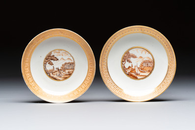 A pair of Chinese gilt-decorated sepia 'Riverscape' cups and saucers, Jiaqing