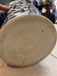 Two Chinese blue and white 'Lotus Scroll' vases and covers, Kangxi