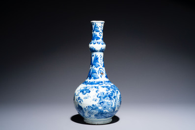A rare Chinese blue and white bottle vase with narrative design, Transitional period