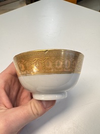 A pair of Chinese gilt-decorated sepia 'Riverscape' cups and saucers, Jiaqing