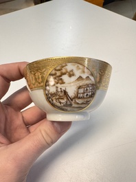 A pair of Chinese gilt-decorated sepia 'Riverscape' cups and saucers, Jiaqing