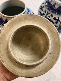 Two Chinese blue and white 'Lotus Scroll' vases and covers, Kangxi