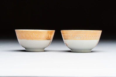 A pair of Chinese gilt-decorated sepia 'Riverscape' cups and saucers, Jiaqing
