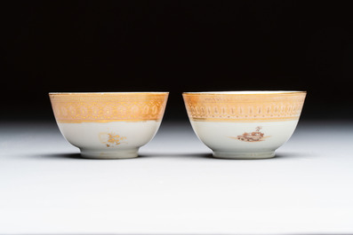 A pair of Chinese gilt-decorated sepia 'Riverscape' cups and saucers, Jiaqing