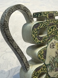 A pair of Chinese verte biscuit 'Shou' wine ewers, 19th C.