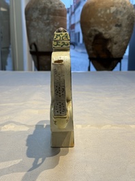 A pair of Chinese verte biscuit 'Shou' wine ewers, 19th C.