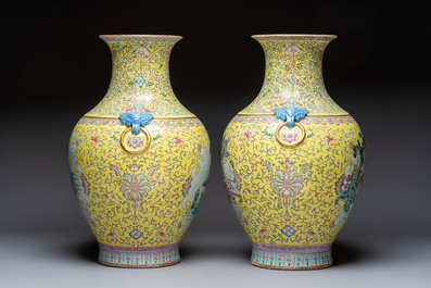 A pair of large Chinese famille rose yellow-ground 'Hu' vases with narrative design, Qianlong mark, Republic