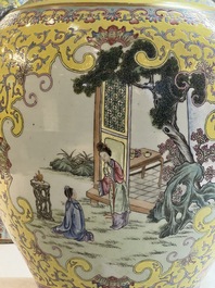 A pair of large Chinese famille rose yellow-ground 'Hu' vases with narrative design, Qianlong mark, Republic