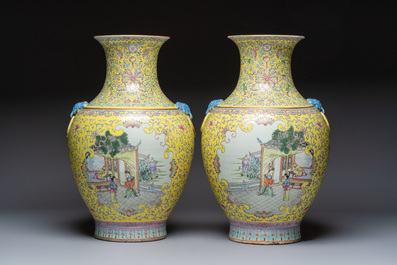 A pair of large Chinese famille rose yellow-ground 'Hu' vases with narrative design, Qianlong mark, Republic