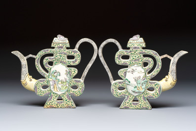 A pair of Chinese verte biscuit 'Shou' wine ewers, 19th C.