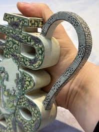A pair of Chinese verte biscuit 'Shou' wine ewers, 19th C.