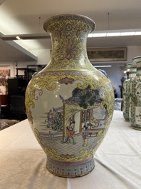 A pair of large Chinese famille rose yellow-ground 'Hu' vases with narrative design, Qianlong mark, Republic