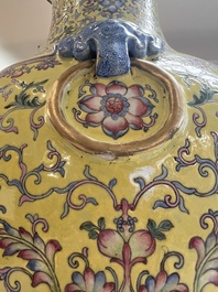A pair of large Chinese famille rose yellow-ground 'Hu' vases with narrative design, Qianlong mark, Republic
