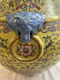 A pair of large Chinese famille rose yellow-ground 'Hu' vases with narrative design, Qianlong mark, Republic
