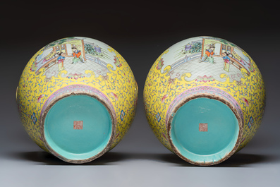 A pair of large Chinese famille rose yellow-ground 'Hu' vases with narrative design, Qianlong mark, Republic