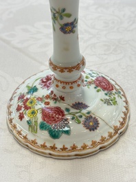 A pair of Chinese famille rose candlesticks with floral design, Qianlong