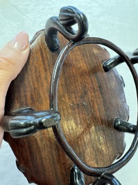 A Chinese Dehua blanc de Chine 'Lotus Leaf and Frog' brush washer on a wooden stand, Kangxi/Yongzheng