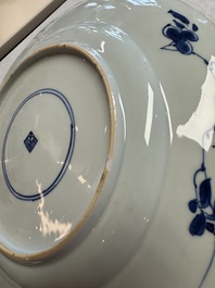 A Chinese blue and white dish with floral design and a famille rose 'HeHe Erxian' plate, Kangxi/Yongzheng