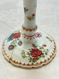 A pair of Chinese famille rose candlesticks with floral design, Qianlong
