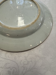 A pair of Chinese famille rose 'Peacock and Flowers' plates, Yongzheng