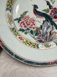 A pair of Chinese famille rose 'Peacock and Flowers' plates, Yongzheng