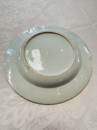 A pair of Chinese famille rose 'Peacock and Flowers' plates, Yongzheng
