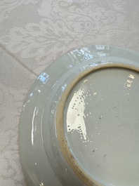 A pair of Chinese famille rose 'Peacock and Flowers' plates, Yongzheng