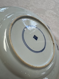A Chinese blue and white dish with floral design and a famille rose 'HeHe Erxian' plate, Kangxi/Yongzheng