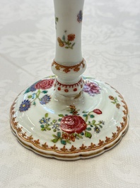 A pair of Chinese famille rose candlesticks with floral design, Qianlong