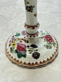A pair of Chinese famille rose candlesticks with floral design, Qianlong